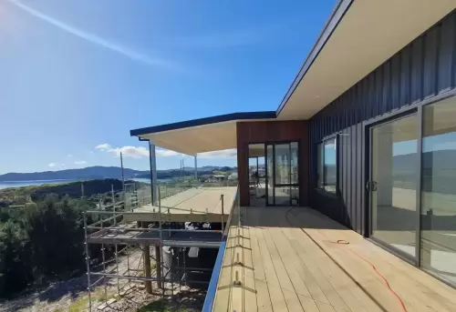 2 bed 2 bath, double garage, cedar & coloursteel long run cladding 208m2